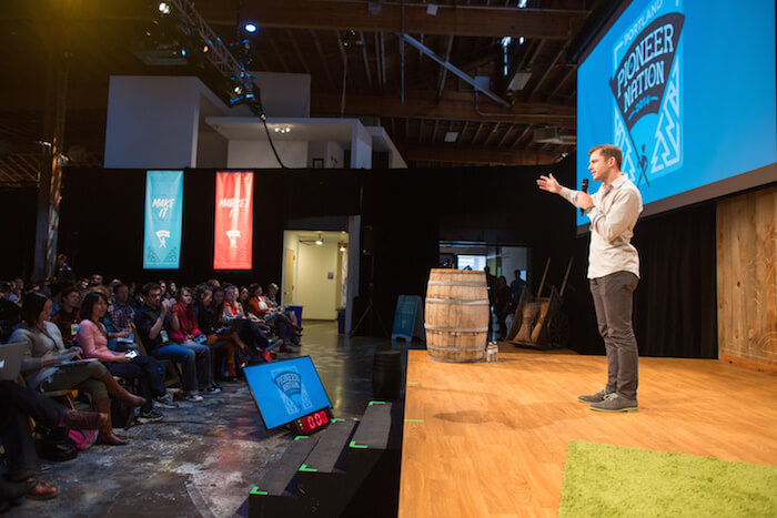 I made a spur of the moment connection with one of the conference organizers, and suddenly Chris Guillebeau was introducing me to get on stage!